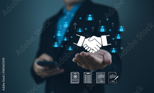 Fényképezés touch partner affiliate marketing global business collaboration-concept Businessman presenting digital handshake concept with networking icons in a professional setting