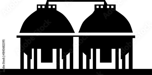 silhouette of a factory with tanks