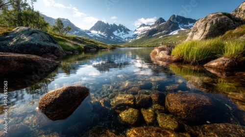 Experience the awe of majestic mountains reflected in a clear lake, an inspiring image that evokes a feeling of serenity and connection with the great outdoors.