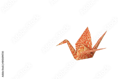 richly textured orange and gold patterned origami crane with detailed folds, in a grounded resting position, symbolizing longevity, svg file, transparent, no background