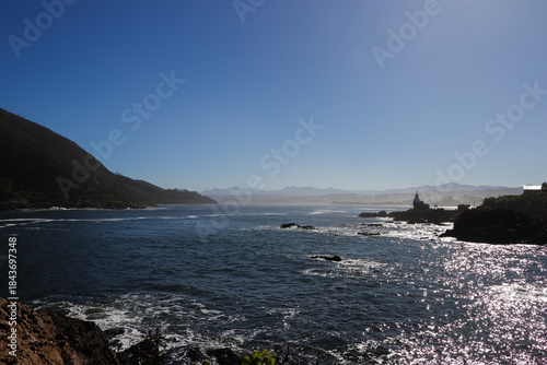 Knysna Heads River Inlet With Rocky Outcrops Overlooking Knysna Lagoon And Distant Mountain Horizon, South Africa
