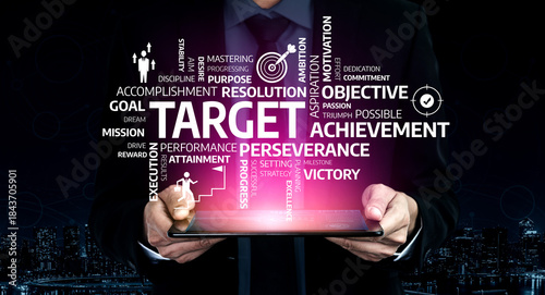 A dynamic image featuring hands holding a tablet displaying a vibrant diagram focused on target achievement, showcasing various motivational and success-oriented terms relevant in business. Tessel