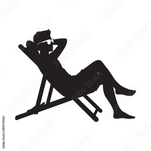 A silhouette of a person relaxing on a beach chair in the sun