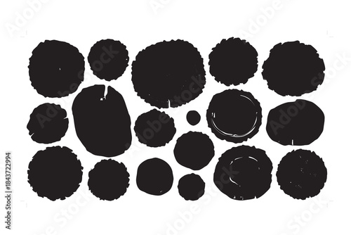 Ink blot pattern with various black splotches on white background
