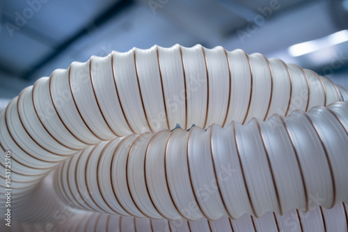 Flexible PUR antistatic suction hose for air conditioning, background flexi hose, industrial ventilation.	