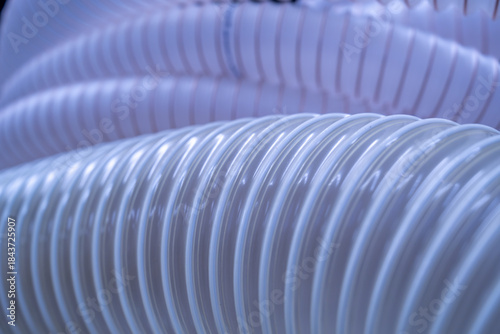 Flexible PUR antistatic suction hose for air conditioning, background flexi hose, industrial ventilation.	