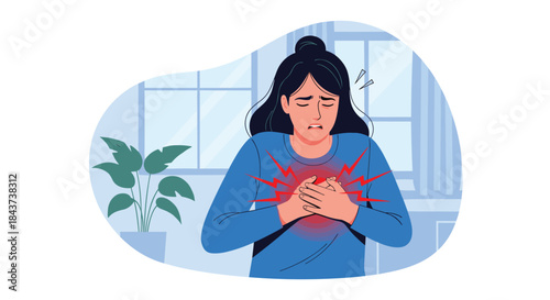 Woman clutches her chest in a painful radiating chest pain moment as distress and worry rise and she seeks urgent help indoors in a quiet room.