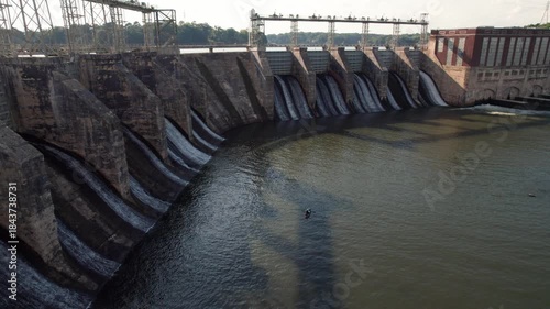 Kayaker explores area near hydroelectric dam