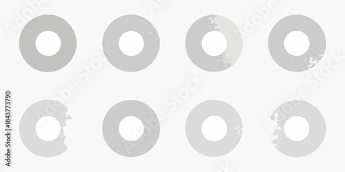 Arrangement of grayscale circular shapes with varying degrees of fill