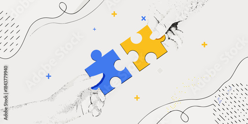 Connecting the pieces a hand fitting puzzle parts together creatively