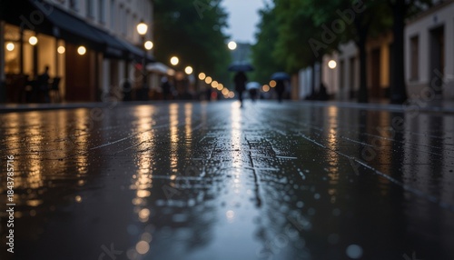 雨に濡れた石畳のヨーロッパの街並み / Rain-soaked cobblestone street in a European city
