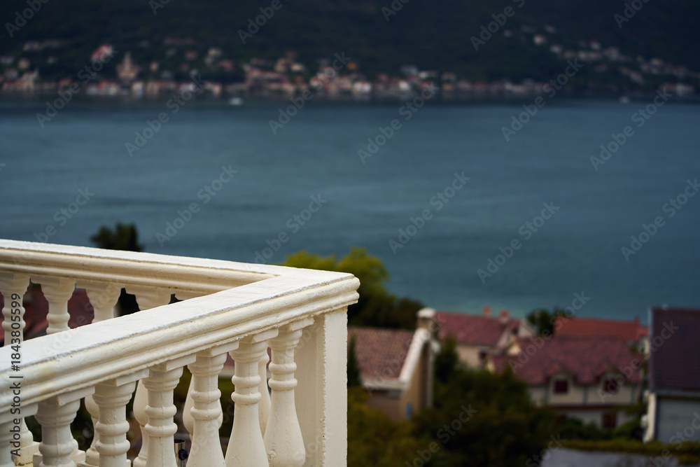 Fototapeta premium Peaceful sea view from white railing