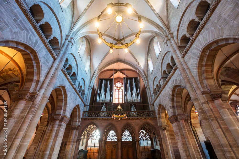 Fototapeta premium Basler Munster cathedral interior nave and ceiling vault. Basel, Canton of Basel-Stadt, Switzerland.