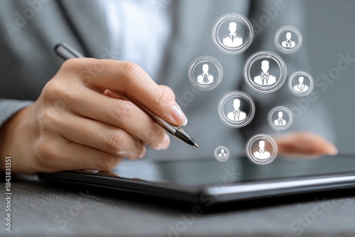 Business professional uses tablet for digital communication and networking with contacts during work session