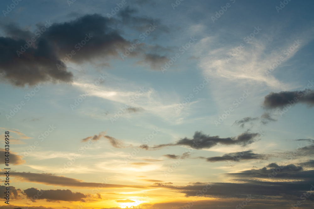 Fototapeta premium Sunset in the clouds. Sky background.
