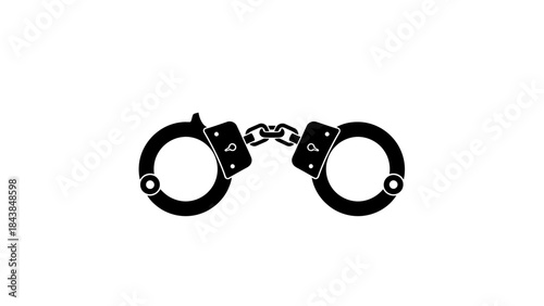 a stark depiction shows a pair of black metal handcuffs symbolizing restraint law enforcement and the concept of legal detention or imprisonment high quality professional
