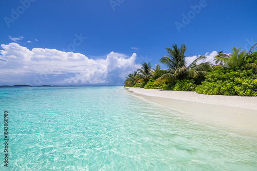Fototapeta Naklejka Na Ścianę i Meble -  Tropical summer island beach landscape. Beautiful peaceful nature scene with turquoise ocean sunny sky and white sandy shore. Tranquil vacation wallpaper background. Idyllic travel holiday destination