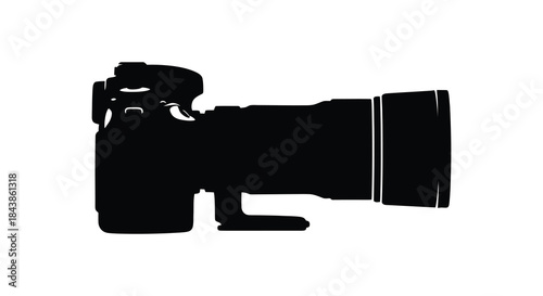 A striking black silhouette of a professional digital slr camera with a large lens silhouette
