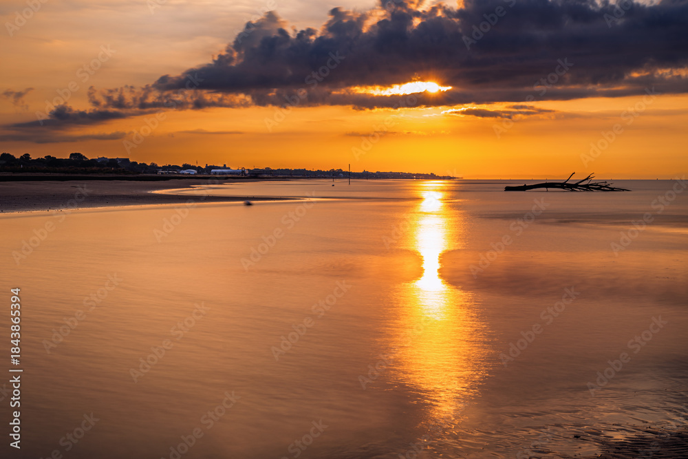 Obraz premium summer sunrise over the lagoon meets the sea, Bibione Pineda, Venice, Italy