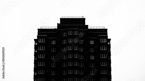 A large black building with many windows