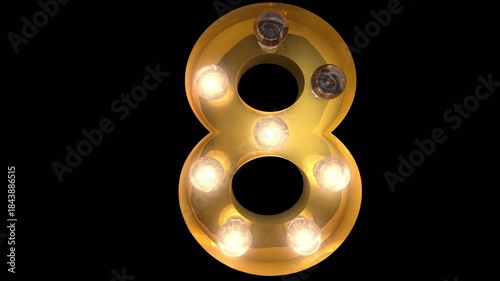 Burlesque retro style glowing Gold light bulb typeface count down with alpha channel.