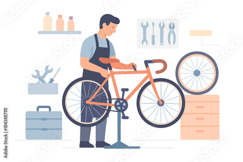 Mechanic fixing bicycle in workshop with tools and equipment