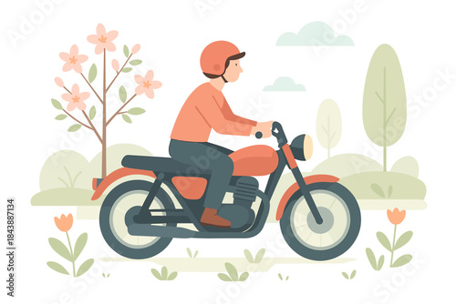 Person riding a vintage motorcycle in spring landscape with blossoming trees