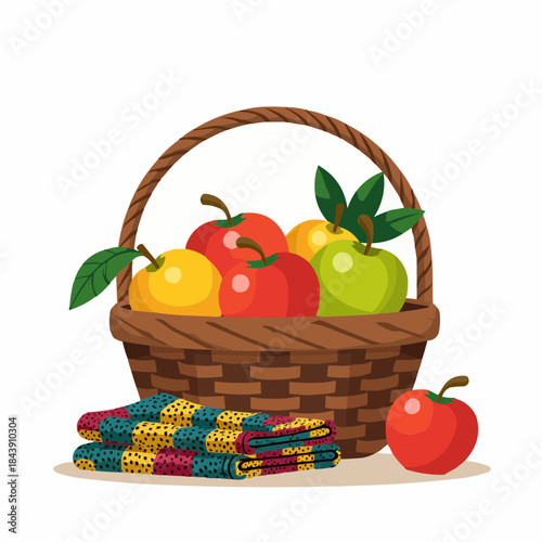 Fruit basket with apples and colorful Kente cloth on white background  