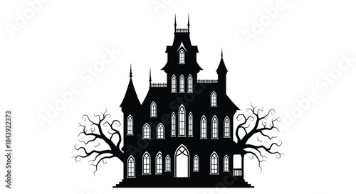 A spooky silhouetted haunted house with gnarled branches and gothic architecture