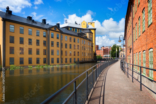 Old industrial area on the Motala ström river in the city centre of Norrköping, Sweden