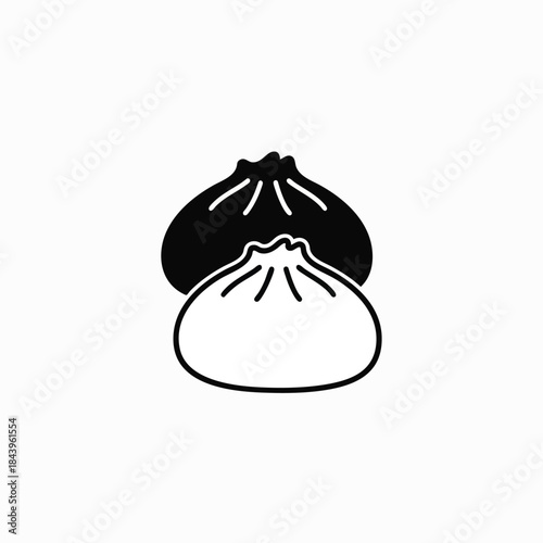 Simple black and white icon of two dumplings on a white background.