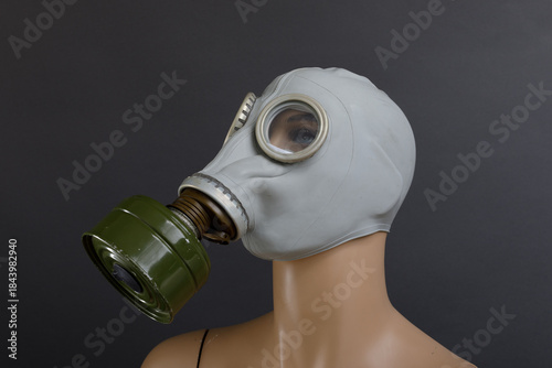 Vintage Soviet Gas Mask on Mannequin, Grey Studio Background