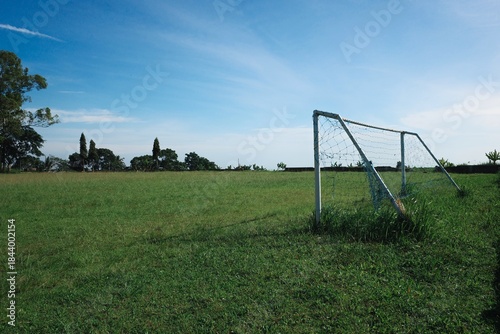 Empty Soccer Field with Goal and Blue Sky, Outdoor Sports Grass Pitch