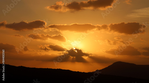 Announcing changing weather sunset near Santorini