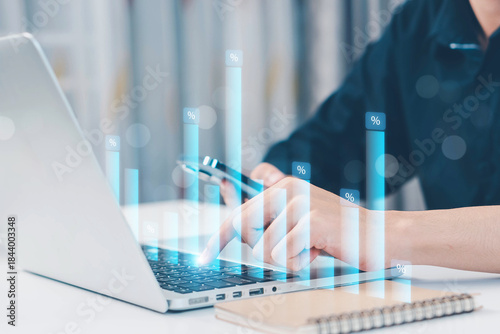 Hand holding graph with percentage, special offer of shopping department store discount and tax concept, adjusting interest rates, raising interest rates to fight inflation, returns on investments.