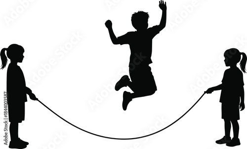 Silhouette of three children playing outdoors with a long jump rope; two girls turning the rope while a boy 