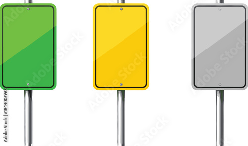 Set of blank traffic signs in green, yellow, and gray colors mounted on metal poles for road safety, navigation, and design templates
