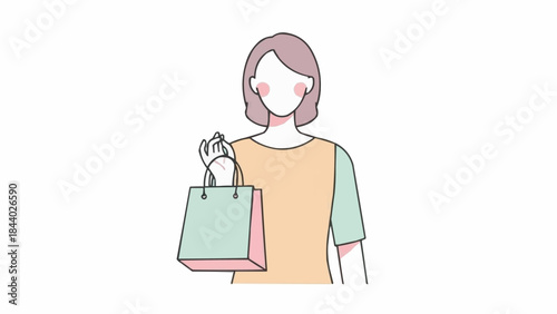 Woman holding a shopping bag with a smile.