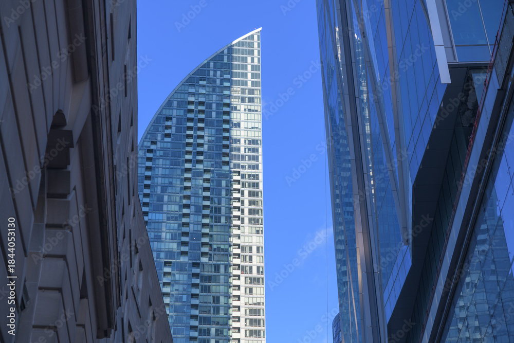 Fototapeta premium view of L-Tower, a 58 storey residential skyscraper designed by Daniel Libeskind, located at 8 The Esplanade, Toronto