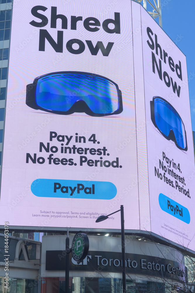 Naklejka premium digital billboard facing Sankofa Square featuring PayPal advertising, Toronto