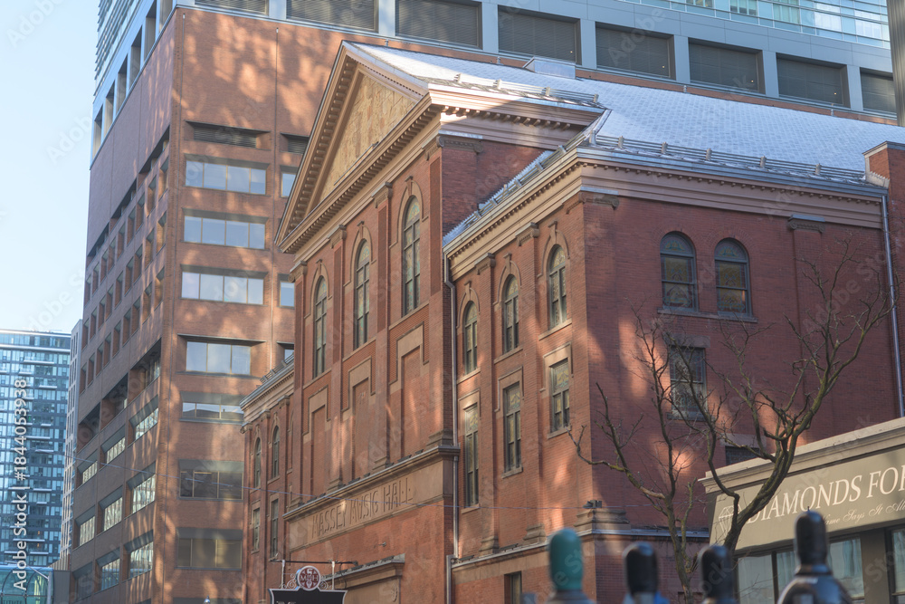 Fototapeta premium angled view of historic Massey Hall, an event venue, located at 178 Victoria St (seen here from Shuter St), Toronto