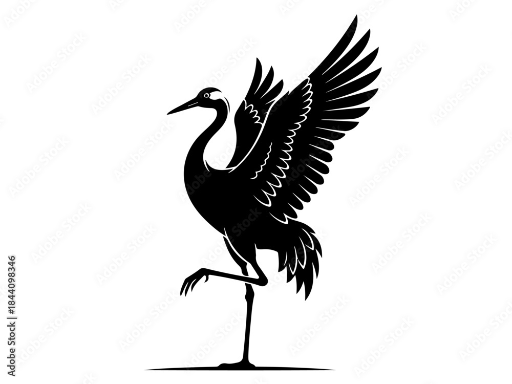 Obraz premium Black silhouette of a graceful crane bird standing on one leg with wings spread against a white background.