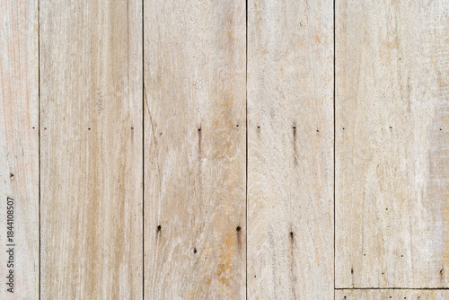 empty brown vertical striped wooden table by top view or old white wood wall or floor for home interior or exterior pattern and texture background or nail wallpaper on vintage retro board timber