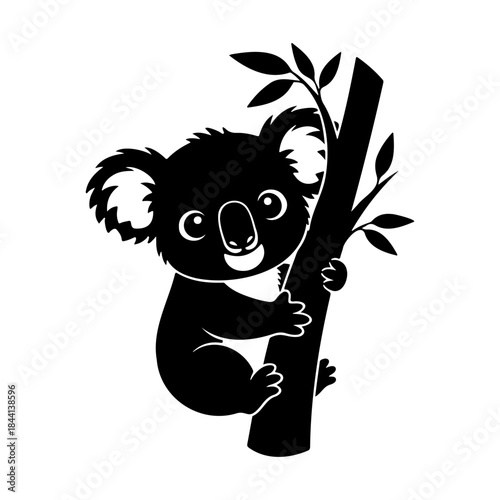 Koala climbing tree