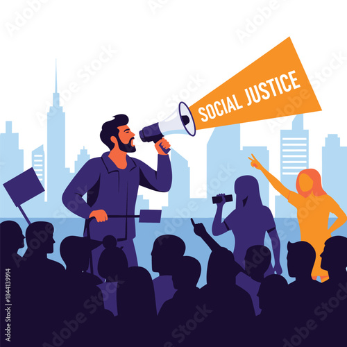 A diverse crowd of activists protests in a city, led by a man speaking \.