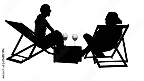 Two people relaxing in beach chairs with drinks on a summer day.