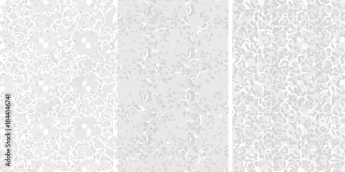 Abstract textured background with delicate floral patterns in grayscale