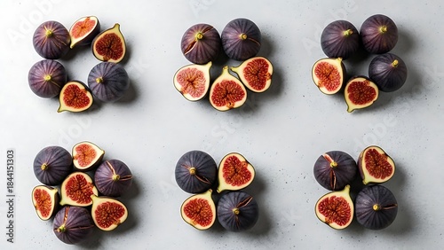 Wallpaper Mural Ripe figs, beautifully presented on a soft grey surface in even groups Torontodigital.ca