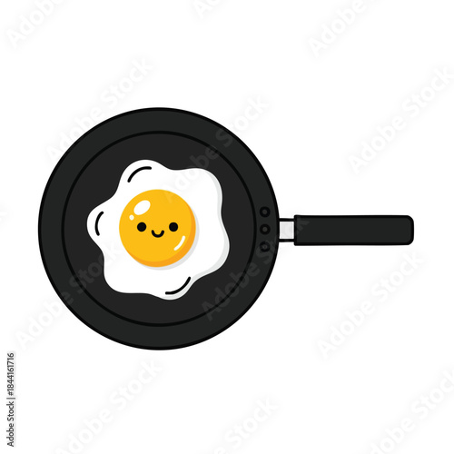 Cute cartoon fried egg with a smiling face in a black frying pan