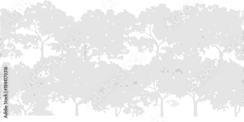 A grayscale silhouette of a dense forest with varied tree shapes